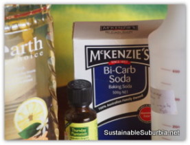 Earth choice dishwashing liquid, Thursday plantation Tea Tree Oil, Bi-Carb Soda and a spray bottle of citrus-vinegar cleaner