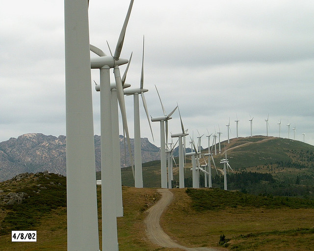 Wind turbines expanding along a ridge in Galicia, Spain