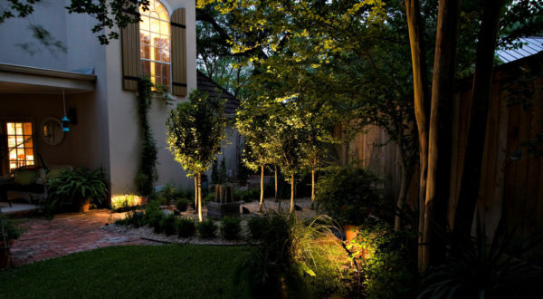 Replacing the incandescent bulbs of older landscape lighting with light-emitting diodes (LED) and solar light fixtures will reduce energy use by 75% and make bulbs last 25 times longer. | SustainableSuburbia.net | image by Jana Perenchio: www.brown-eyedgirlphotography.com/ via flickr